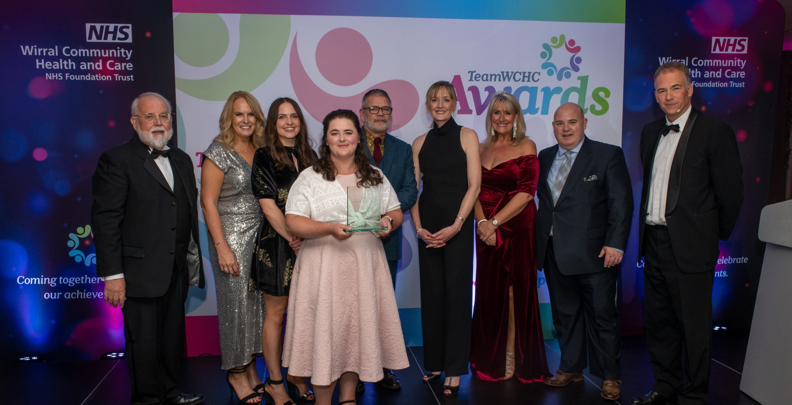 Group of award winning staff at awards evening