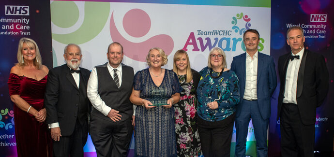 Team accepting an award