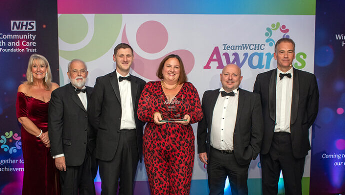 Member of staff accepting an award