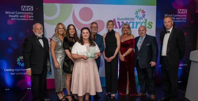 Group of award winning staff at awards evening